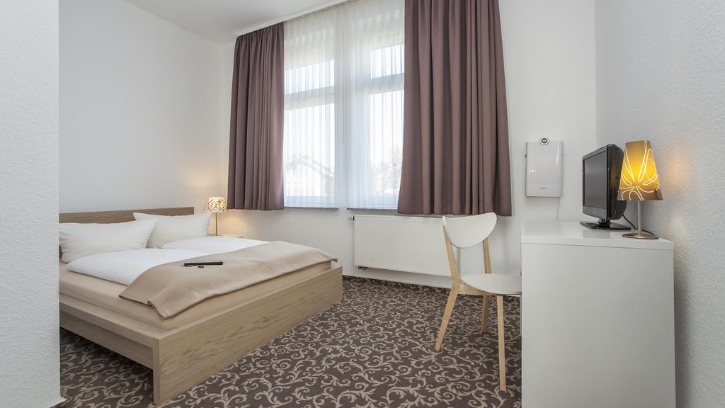 Pension Lok-Inn Walluf Habitación foto