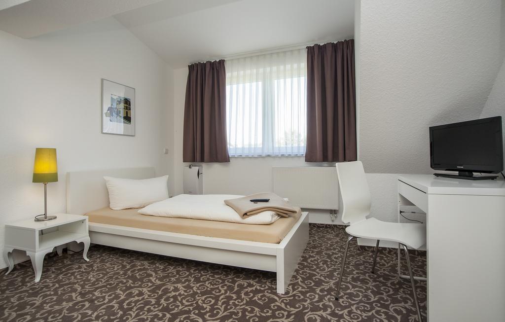 Pension Lok-Inn Walluf Habitación foto